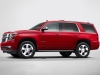2015 Chevrolet Tahoe in Crystal Claret side view from New York reveal showcases Tahoeâs all new design.